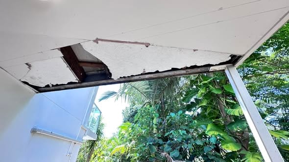 Before: Patio Ceiling Rebuild — Rotted Beam Replaced And Relined