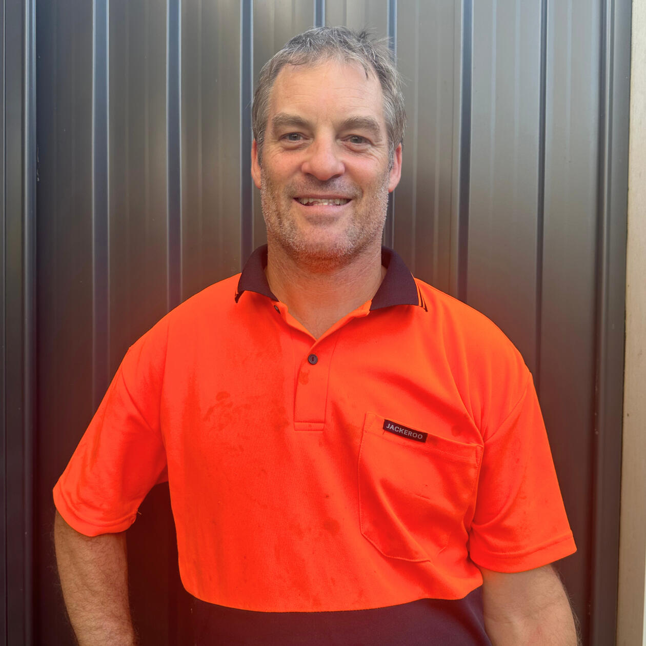 Meet Brett – Your Local Handyman in Noosa Brett Handyman standing in front of workshop in Noosa QLD